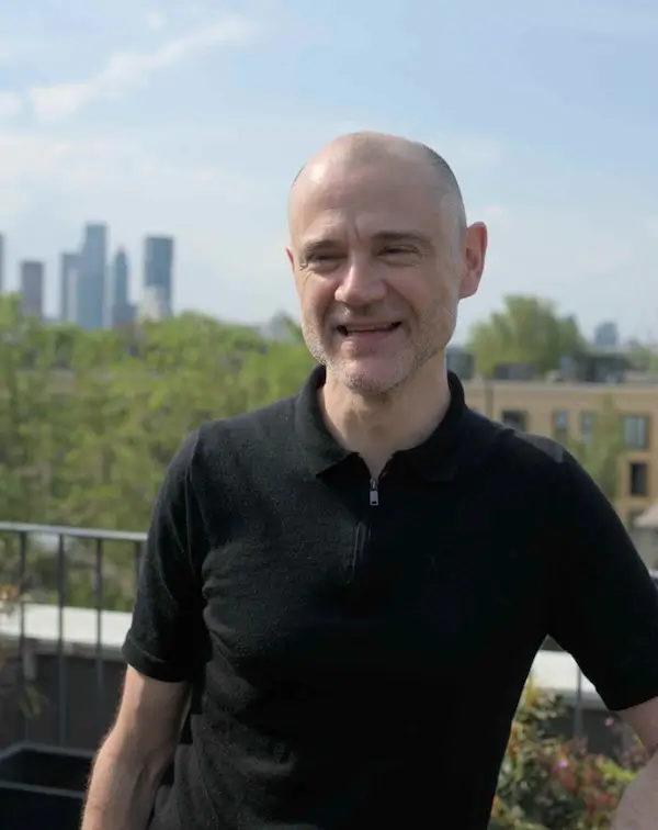 photo kevin mcgee massage therapist with London skyline backdrop.
